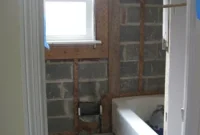 Tearing Out Tile Mortar And Metal Mesh From Bathroom Walls