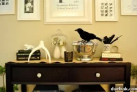 Eerie Elegance: Halloween Decor with Ravens, Flickering Light, and Skulls