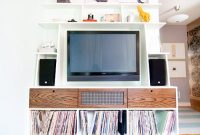 Integrated Shelving to Elevate Your Media Wall