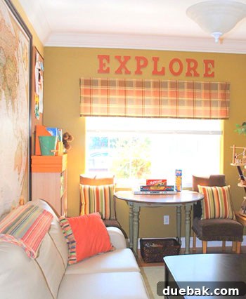 Playroom wall with colorful spray-painted letters above the window