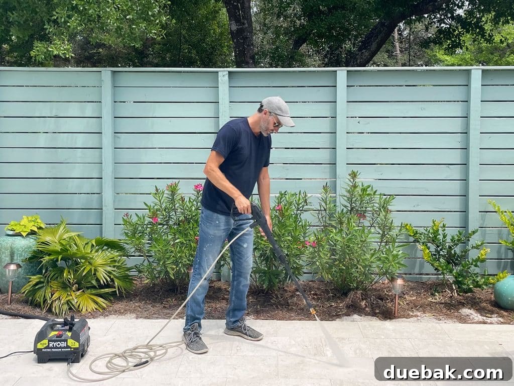 Essential Pressure Washer Tips For First Timers 2 John pressure washing pool deck patio with Ryobi electric power washer