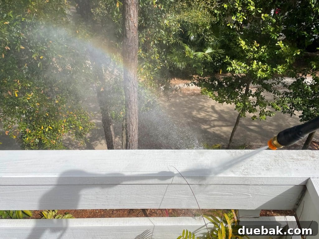 Essential Pressure Washer Tips For First Timers 13 Rainbow created by overspray during pressure washing railings on deck