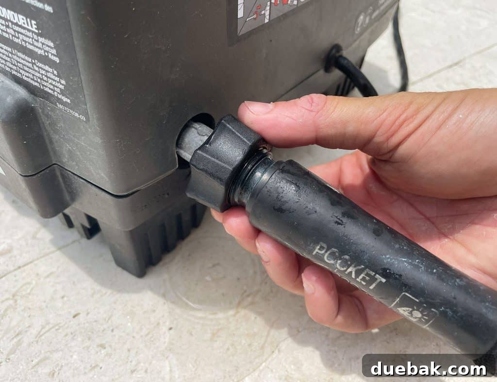 Essential Pressure Washer Tips For First Timers 6 Attaching Pocket Hose To Ryobi Electric Pressure Washer