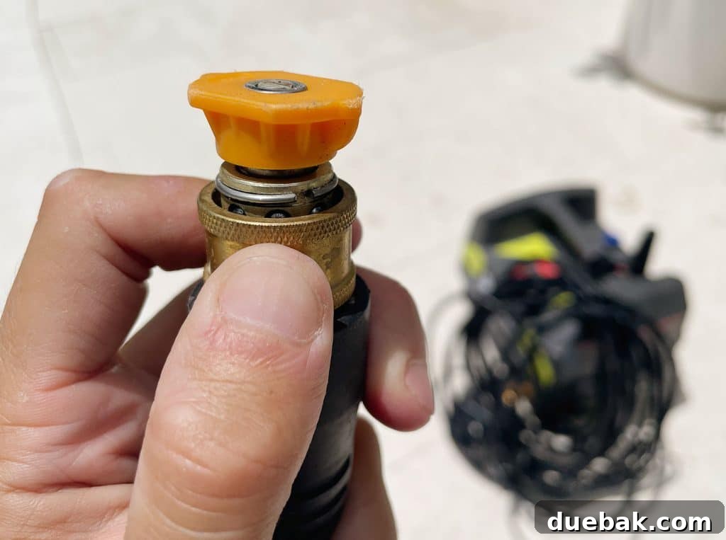 Essential Pressure Washer Tips For First Timers 8 Changing spray nozzle tip on Ryobi electric pressure washer