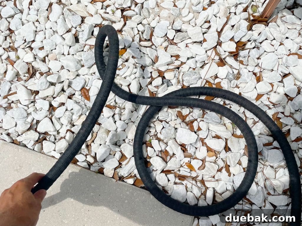 Essential Pressure Washer Tips For First Timers 10 Unkinking pocket hose for use with Ryobi electric pressure washer