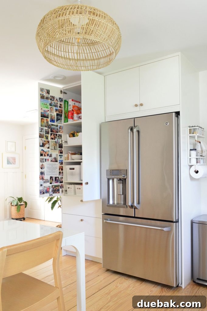 Ikea pantry cabinets with doors open, showcasing organized food storage and efficiency.
