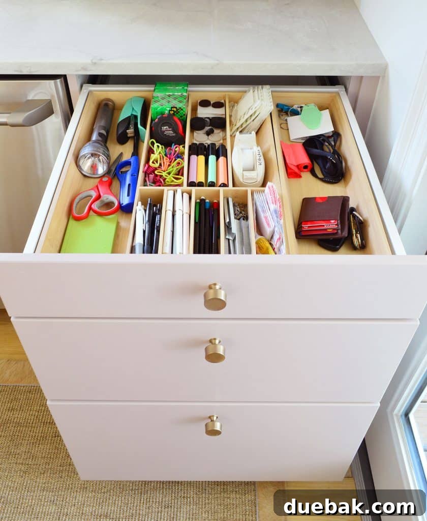 Junk Drawer Open In Base Cabinet Of Renovation Kitchen With Ikea Wood Dividers