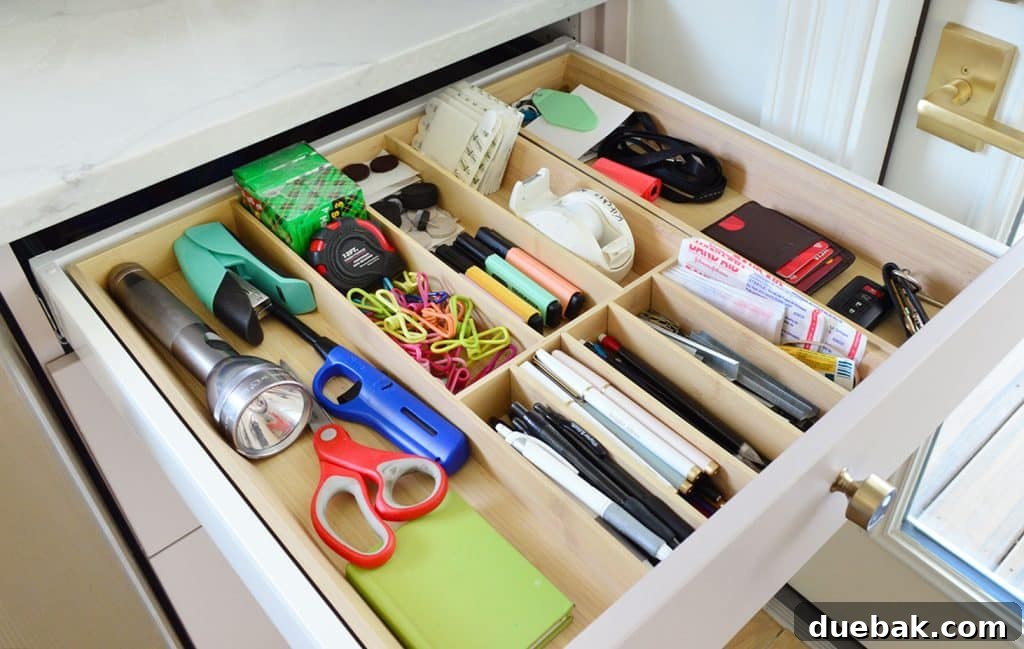 Close Up Of Junk Drawer With Wood Dividers In Ikea Kitchen