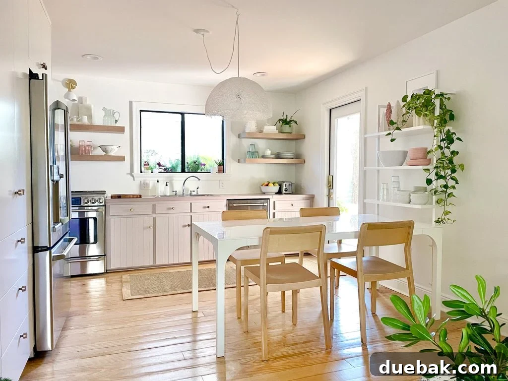 Progress Photo Of Kitchen With Mauve Cabinets and Floating Shelves On wall