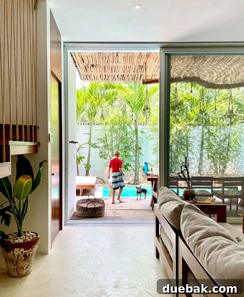 Boy And Dog At Boho Chic Mexican Airbnb Pool