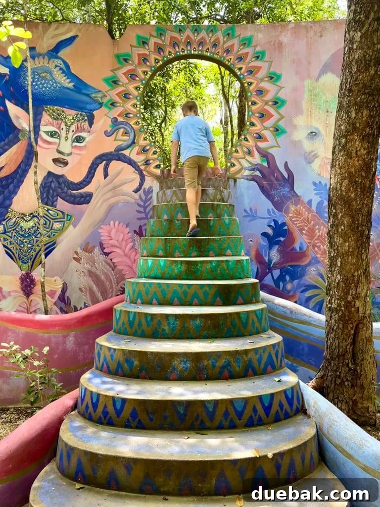 Boy Walking Up Steps Of Holistika Mural Art Walk