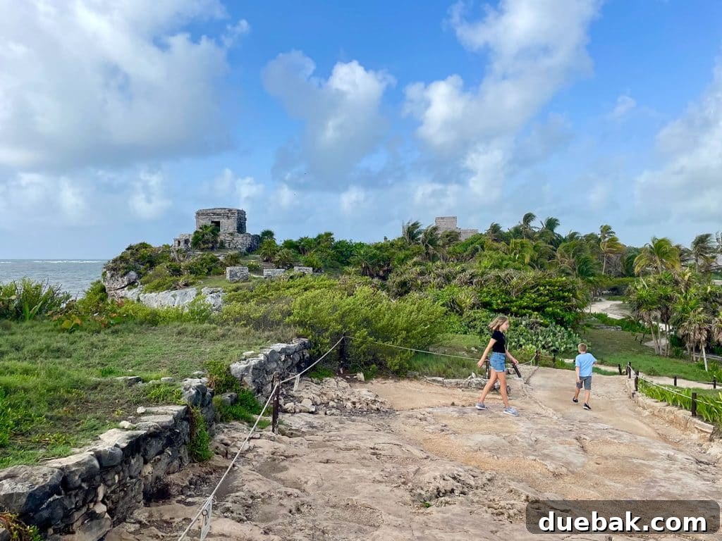 Kids Walking At Tulum Ruins In Mexico