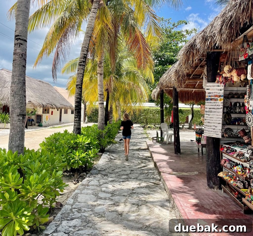 Kid Running Through Shopping in Akumal Mexico