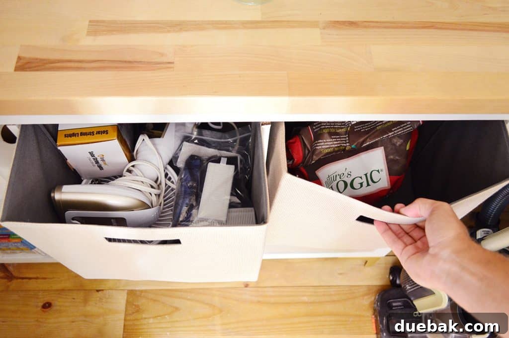 Maximizing Your Utility Closet Space 17 Fabric Bins In Cubby Shelf Pulled Opened With Storage
