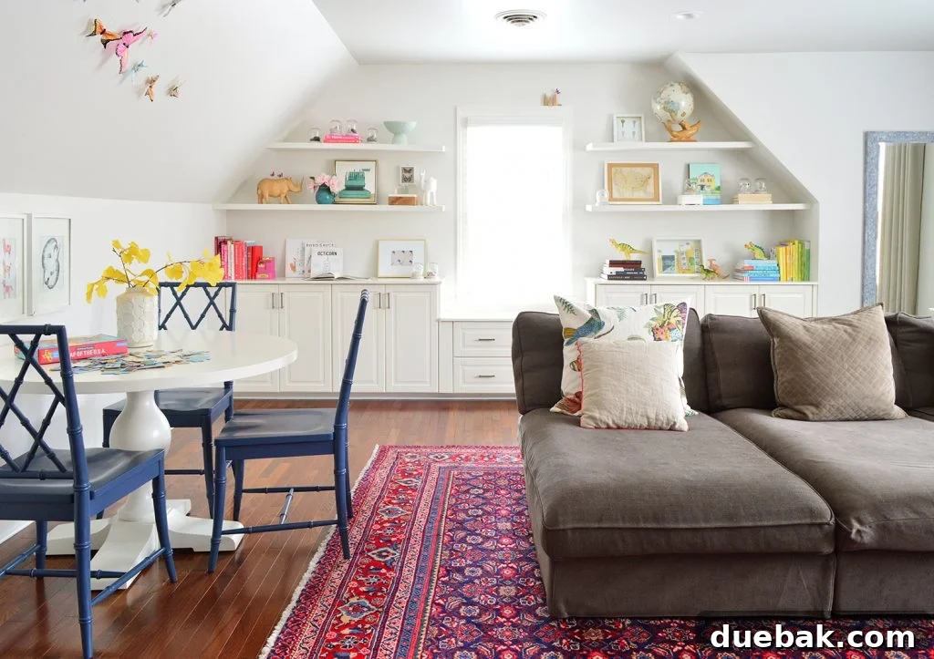 Family bonus play room with traditional rug and oversized couch and built in shelves