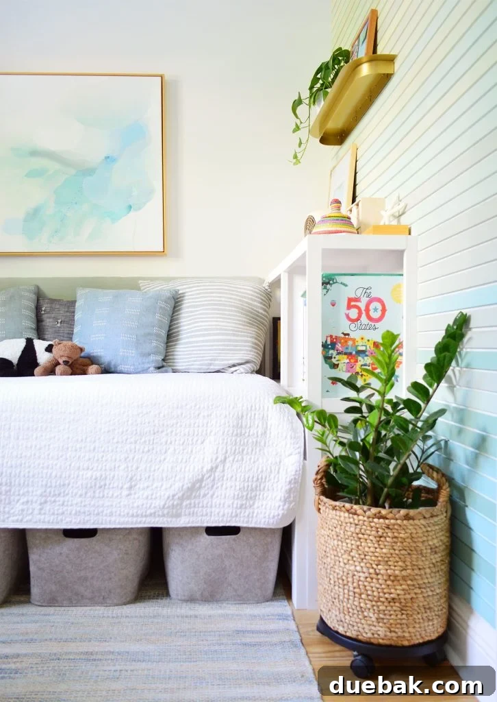 Boys Bedroom With Colorful Wood Wall Treatment And Blue Rug