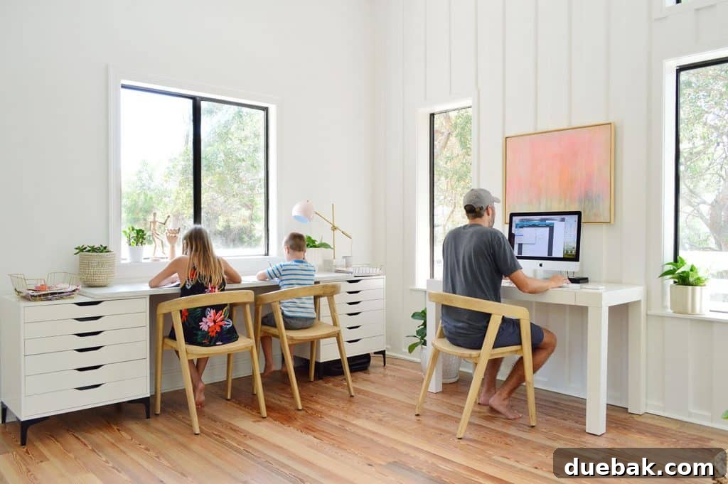 Kids Working At Art Desk With John At Office Desk
