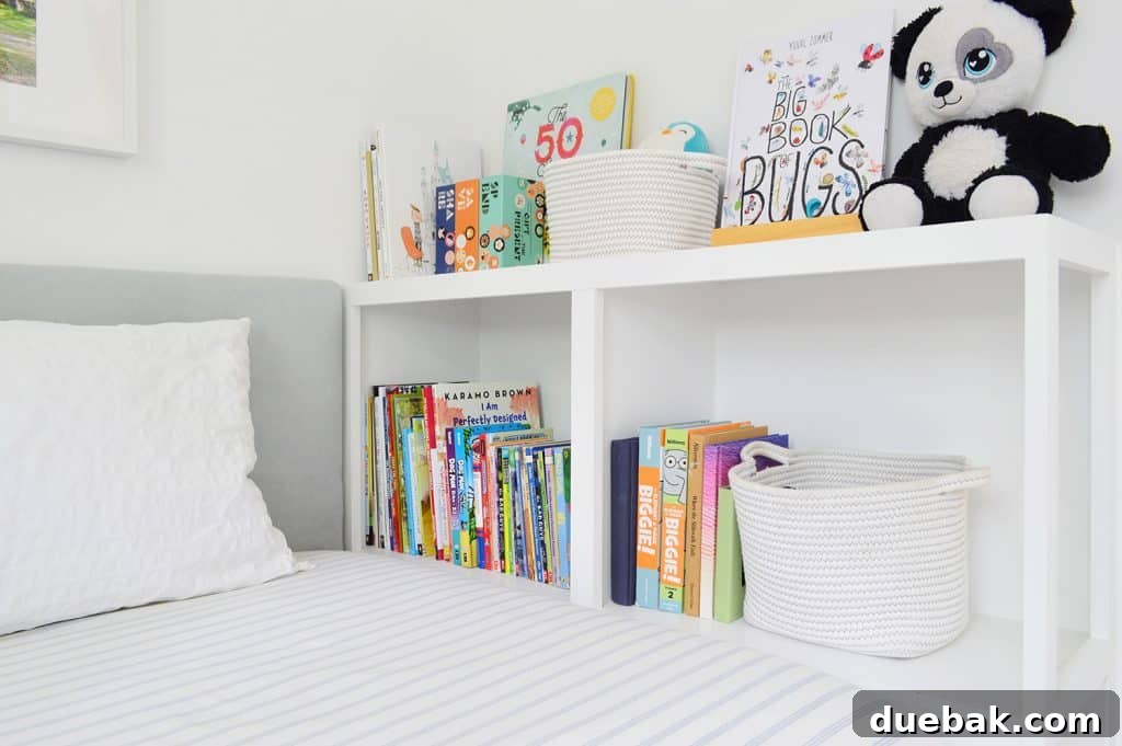Close-up view of the final bookcase, custom-built into the foot of the boy's daybed, showcasing its seamless integration and practical use for everyday essentials.