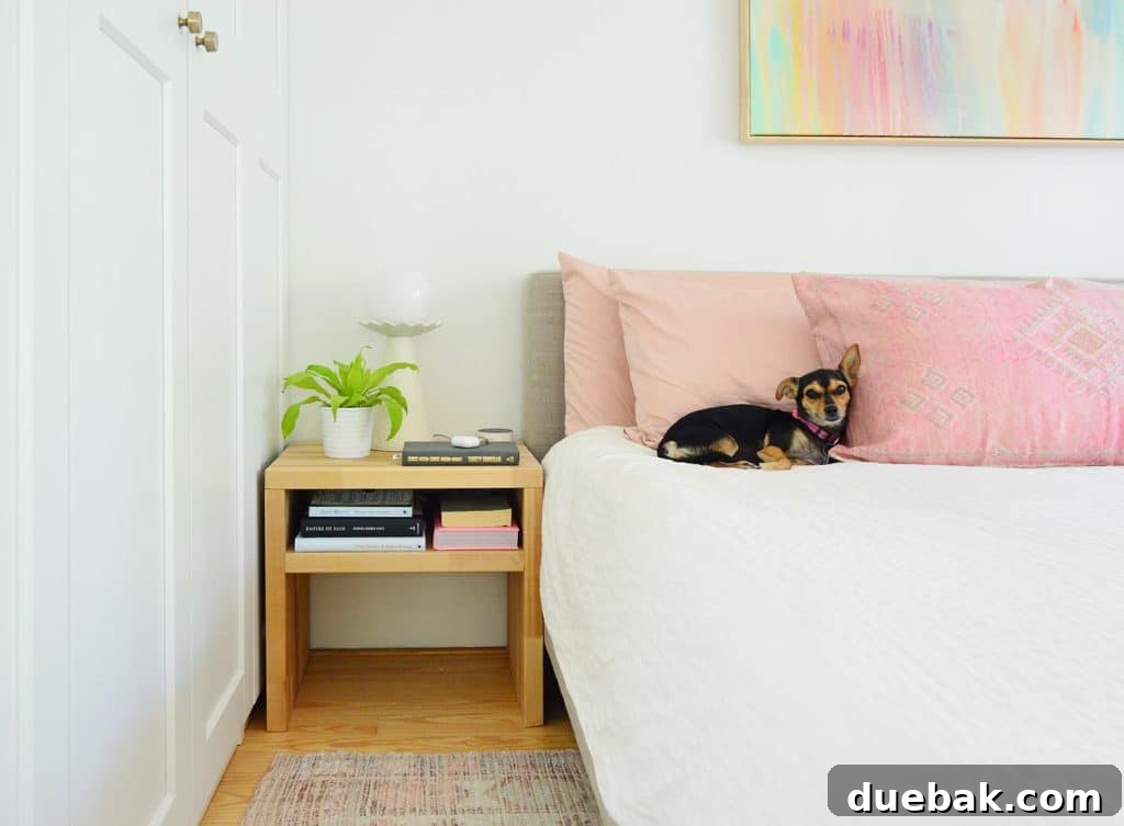 Elevate Your Bedroom with DIY Modern Nightstands 2 Wood Butcher Block DIY Nightstand Next To Bed With Penny The Chorkie Sleeping On Pink Pillow
