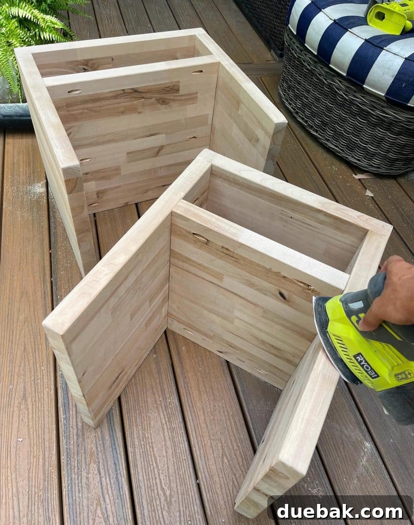 Elevate Your Bedroom with DIY Modern Nightstands 16 Sanding DIY Butcher Block Nightstands With Mouse Sander for Smooth Edges