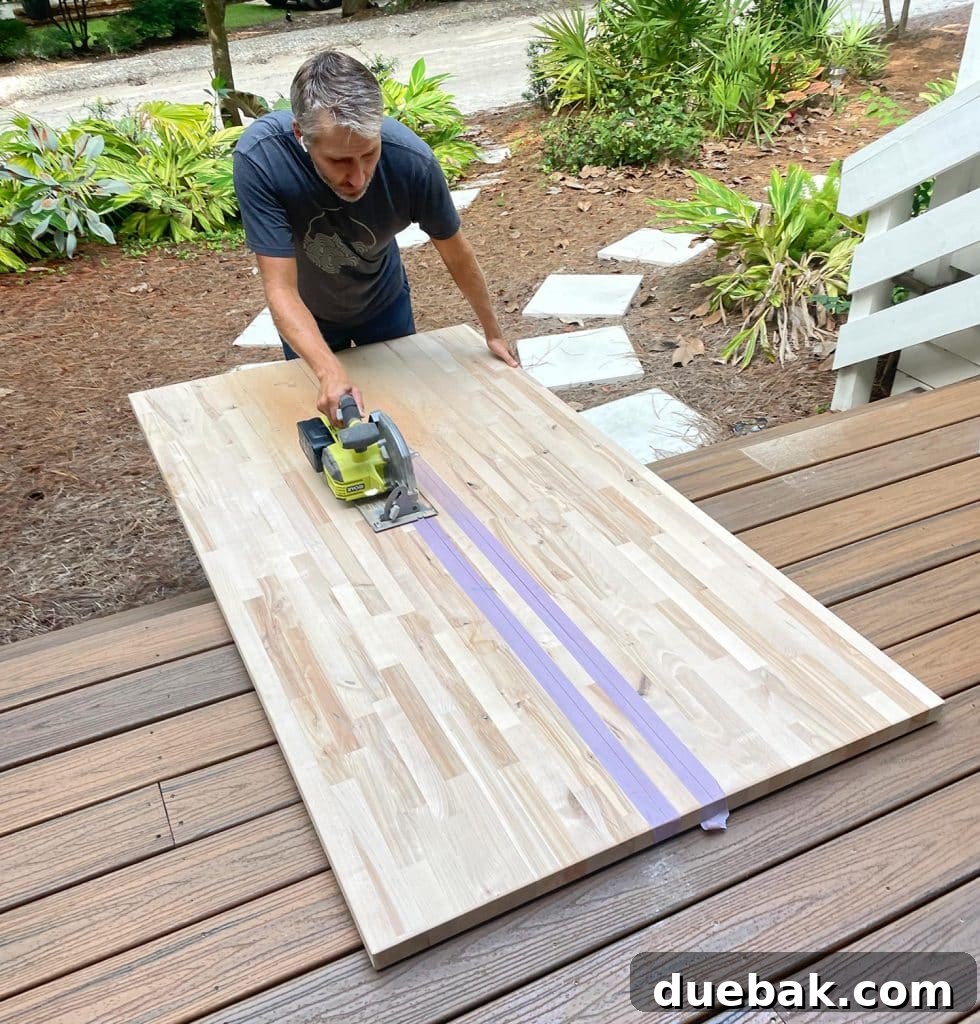 Elevate Your Bedroom with DIY Modern Nightstands 6 John Cutting Butcher Block Island Counter Top In Half With Circular Saw on a porch