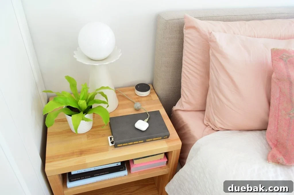 View Of Top Of Butcher Block Nightstand With Modern Lamp