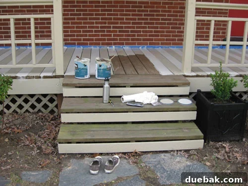 Painted deck planks with a clear stripe pattern and areas left to finish