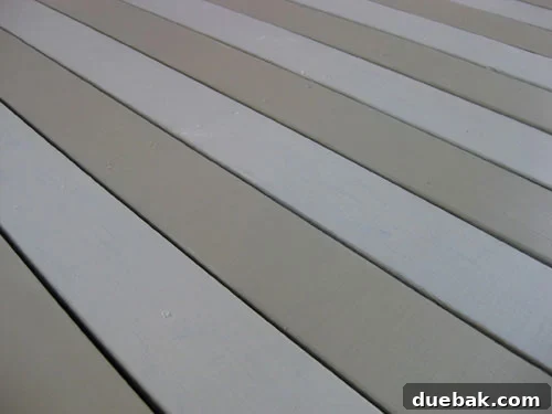 Finished striped porch with painted edges, bright and refreshed
