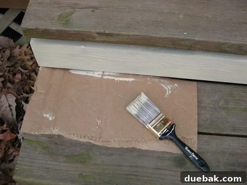 Using cardboard to shield stair treads while painting risers