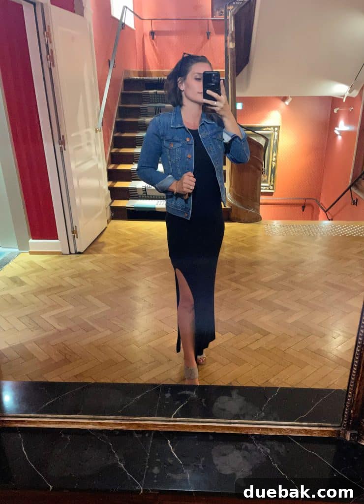 Parisian Chic Packing Secrets 4 Sherry selfie in hotel mirror with long black dress and sandals