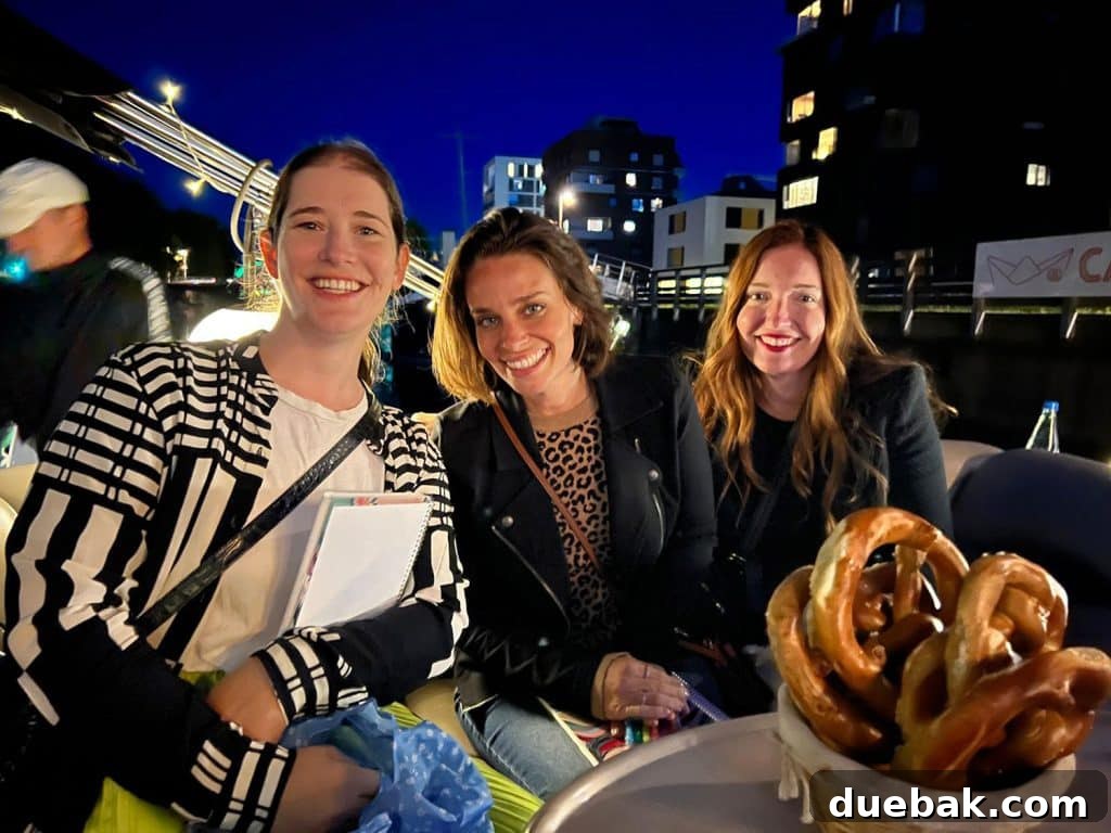 Parisian Chic Packing Secrets 32 Sherry with other girls on riverboat cruise with leopard sweater under a black blazer