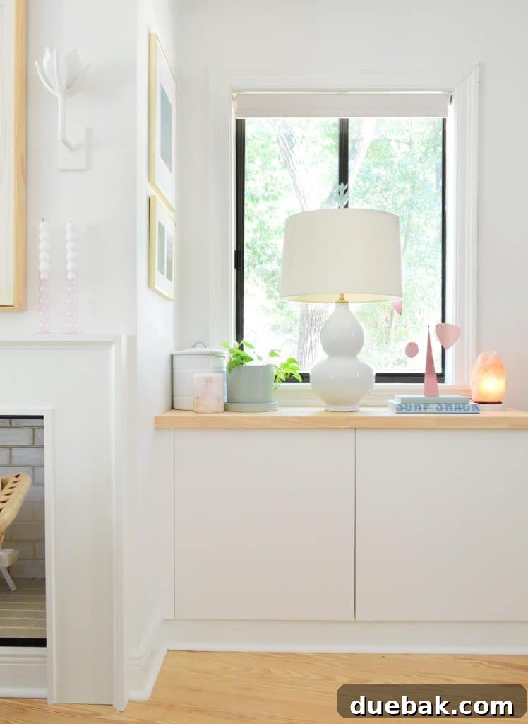 Ikea Besta Built In Next To Fireplace With Lamp and Butcher Block Counter