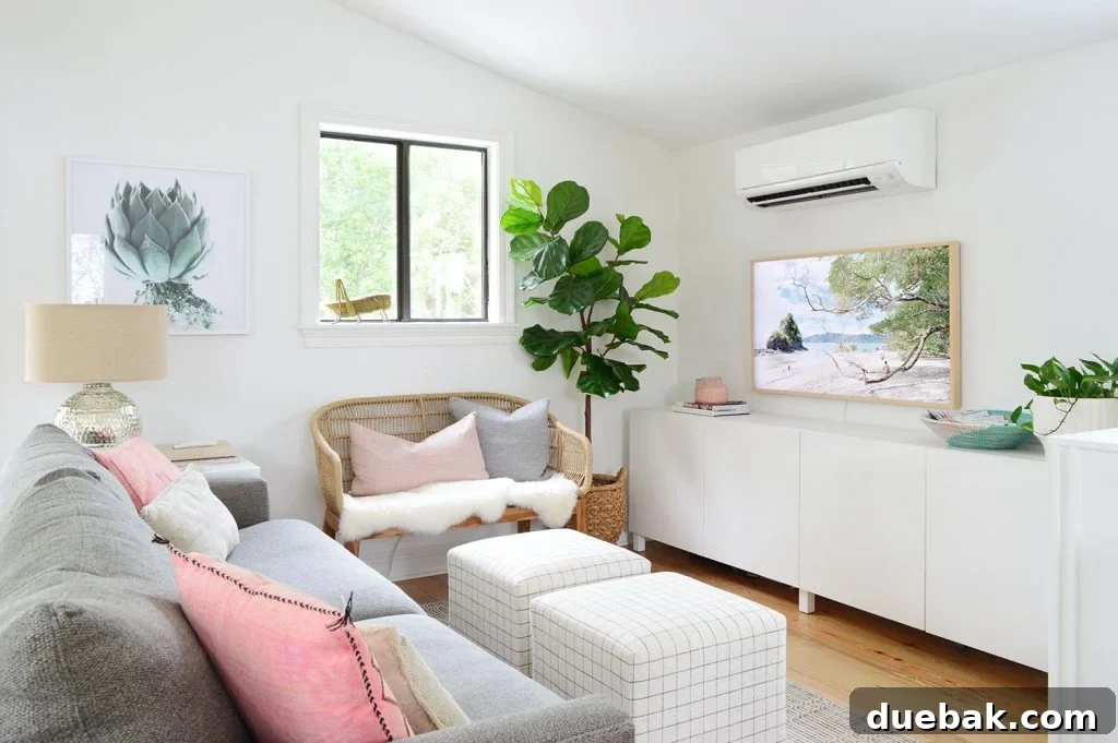 A spacious living room designed with a prominent white IKEA Besta cabinet serving as a media console, creating a clean and modern aesthetic.