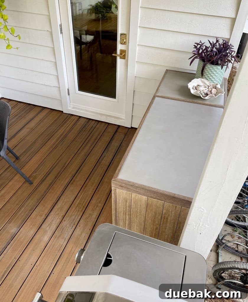 Overhead View Of West Elm Portside Outdoor Cabinet With Extra Counter Workspace, illustrating its utility.