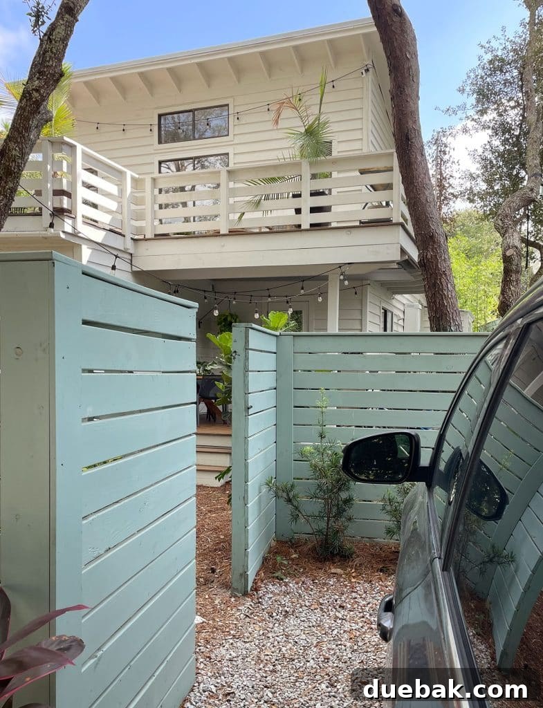 Open Fence Gate Showing Car Parking Access To Kitchen Porch, highlighting convenient access.