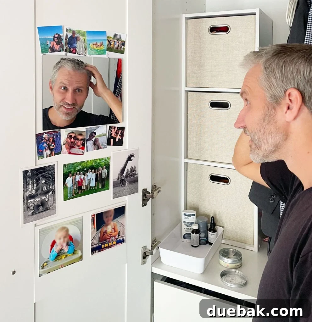 John getting ready in closet mirror in Ikea Pax Wardrobe