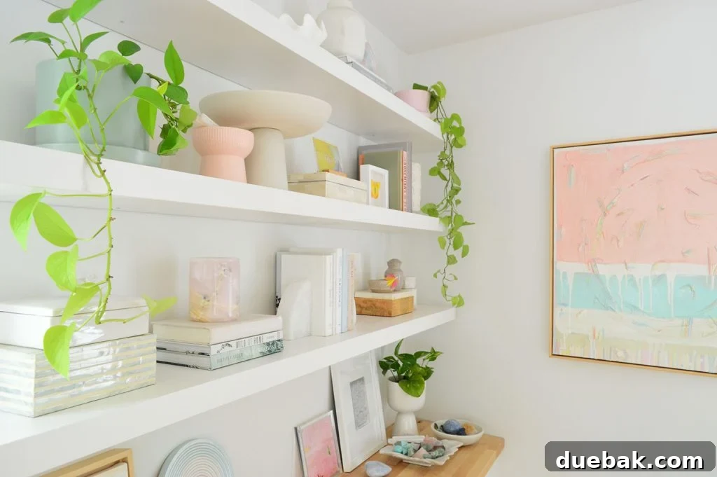 Side View of Three Ikea Lack Floating Shelves With Modern Pink Painting