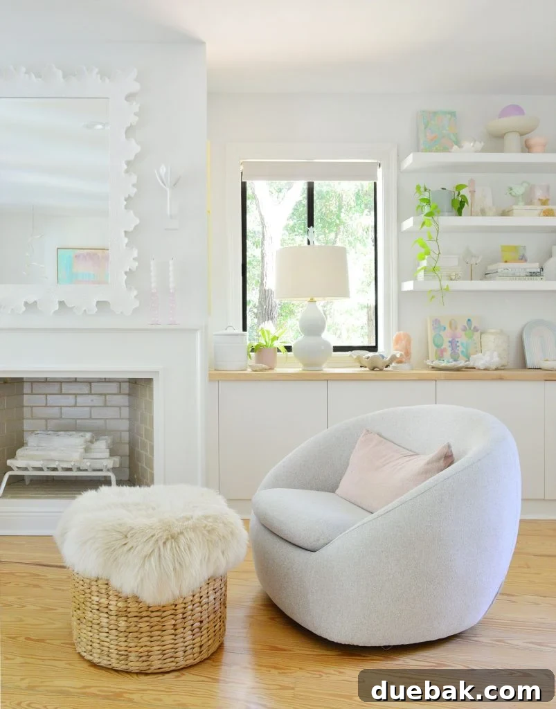 White Beachy Bedroom With West Elm Swivel Chair By Fireplace