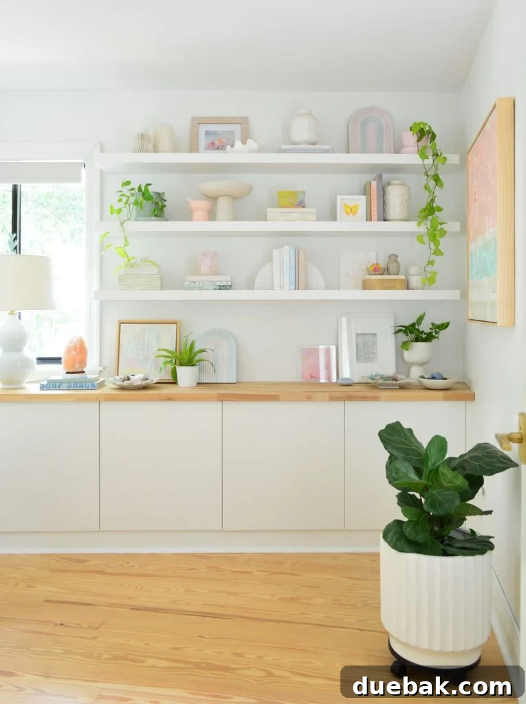 Three Ikea Lack Floating Shelves Over Ikea Besta Storage Console With Butcher Block Counter
