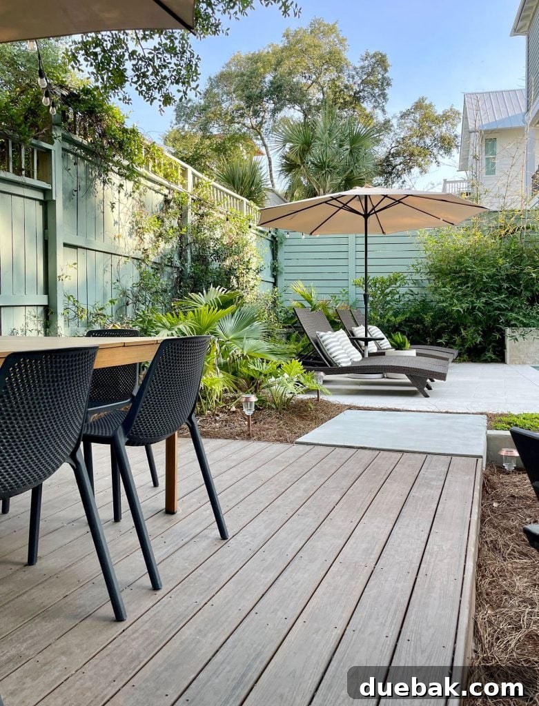 Trex Platform Deck With Dining Table By Backyard Pool 