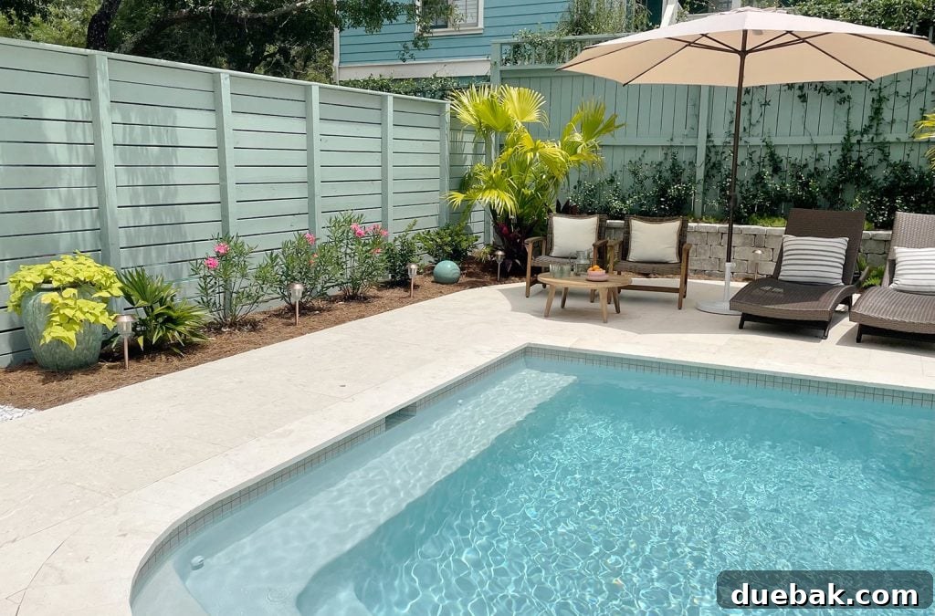 Small Backyard Pool With Fence Along One Side