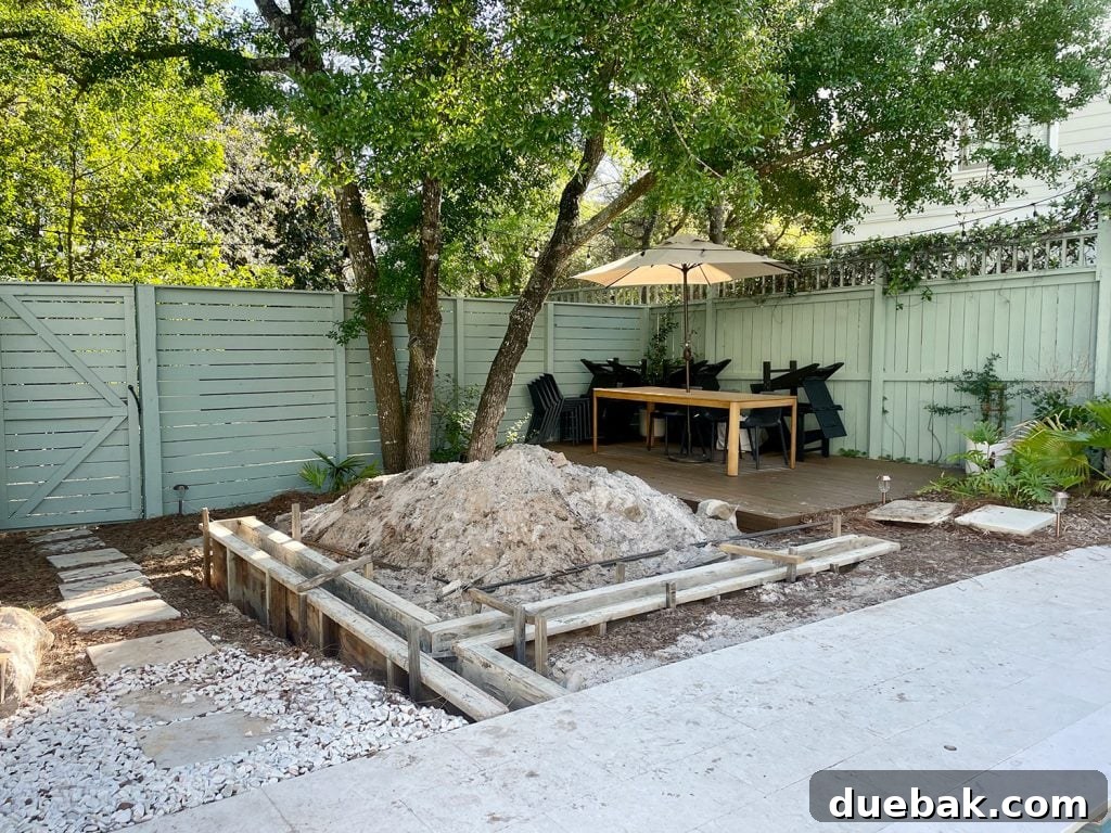 Yard Area Dug Up For Concrete Retaining Wall