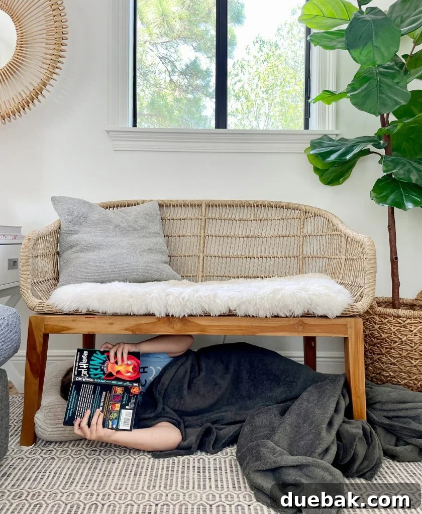 Kid Reading Under A Bench In Living Room With Blanket - Creative Reading Spot