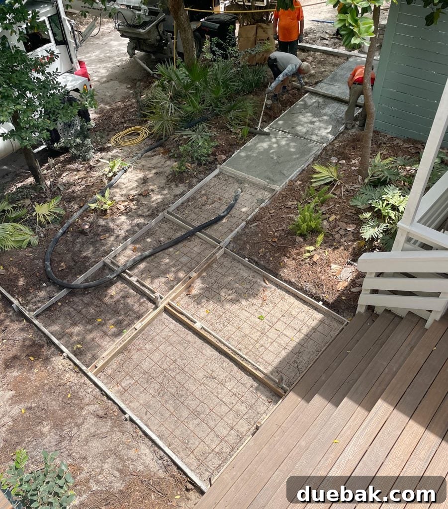 Concrete Being Poured In Front Walkway
