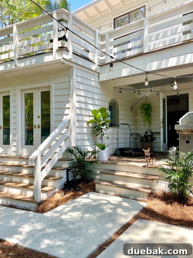 Kitchen Side Porch On White House With Concrete Poured Pavers