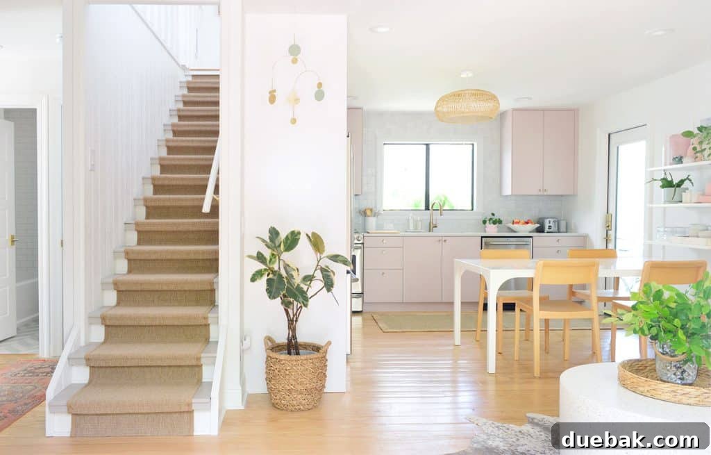 Current Kitchen with Casual Dining Table and Mauve Pink Cabinets