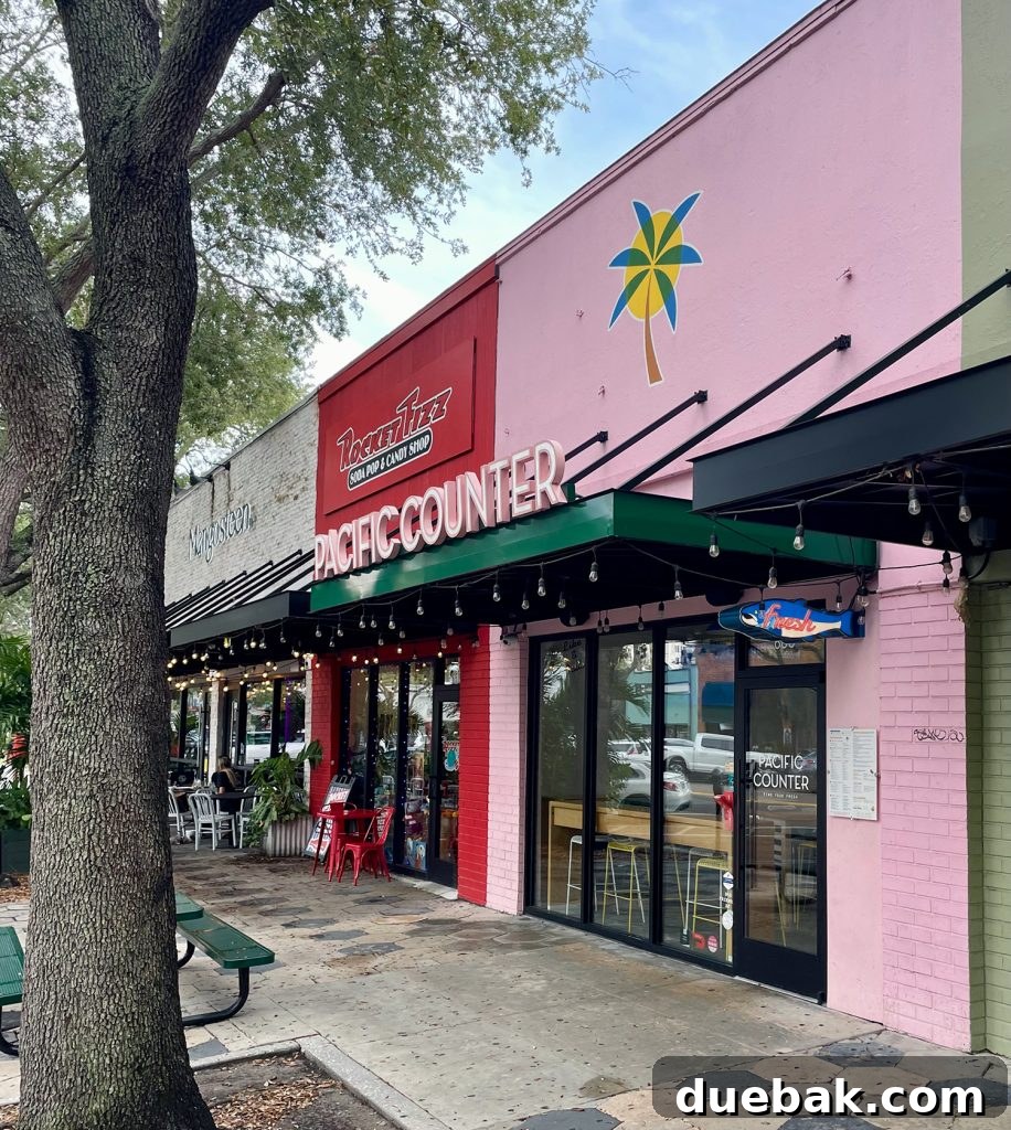 The inviting, modern exterior of Pacific Counter restaurant in Saint Petersburg, Florida.