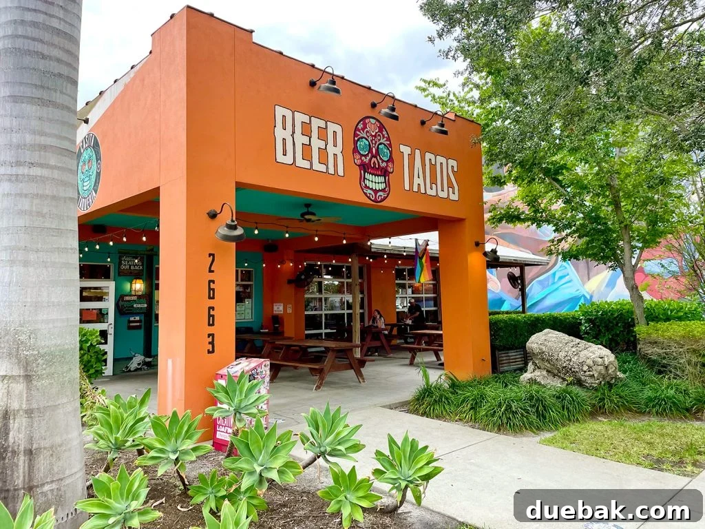 The vibrant exterior of Casita Taqueria, featuring a 'Beer Tacos' sign, in Saint Petersburg, Florida.