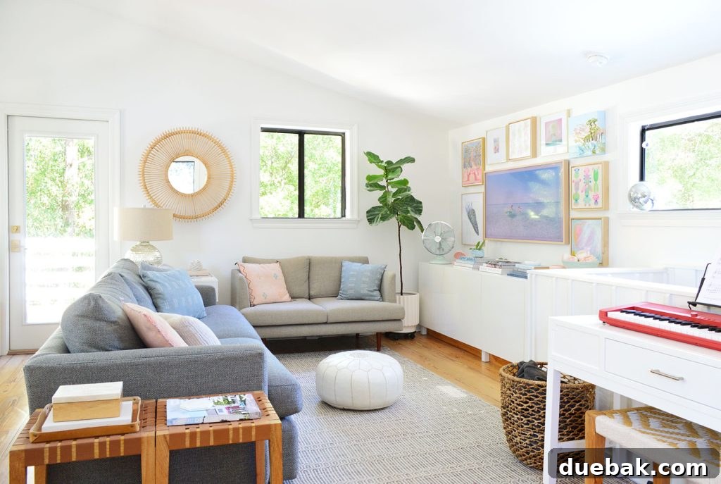 Bright Family Room With Frame TV Collage Hung On Wall