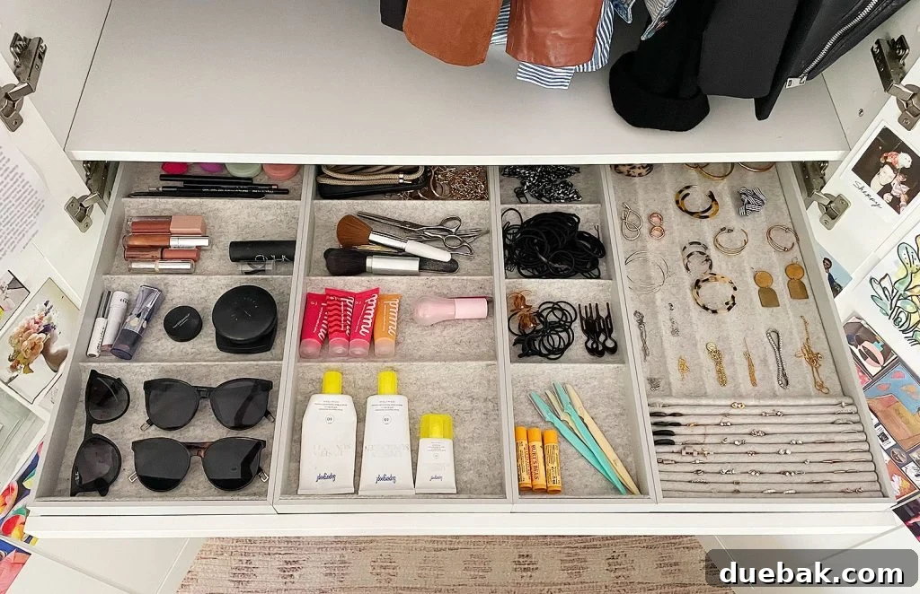 6 Clever Ways We Elevated Our Bedroom 12 Close-up view of an Ikea Pax wardrobe closet's jewelry organizing tray, demonstrating meticulous organization